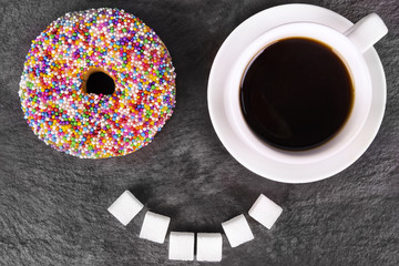 Humorous donut and coffee cup