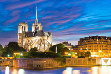 Fototapeta na wymiar Notre Dame Cathedral at dusk in Paris, France
