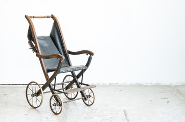 Fototapeta na wymiar classical old vintage style stroller in vintage room