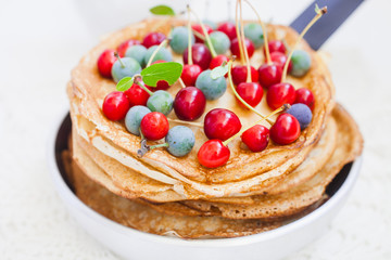 pancakes and berries