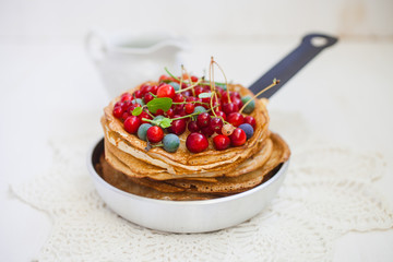 pancakes and berries