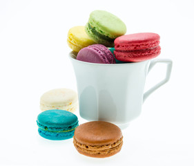Colorful macarons on white background. Macaron is sweet meringue