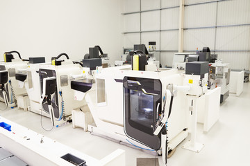 View Of Empty Engineering Workshop With CNC Machines