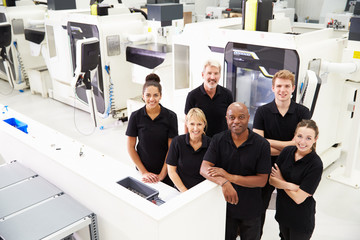 High Angle View Of Engineering Workshop With CNC Machines