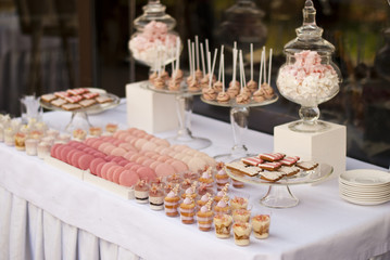 Dessert table for a wedding party - obrazy, fototapety, plakaty