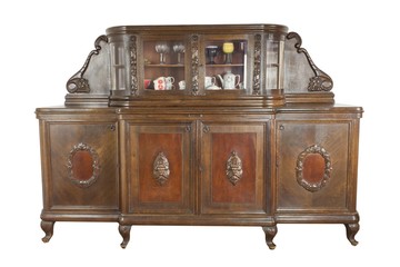 Vintage wooden art Nouveau cabinet isolated on white background. Historical cabinet with glass showcase. Insight into the history of furniture manufacturing.