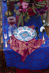 Wedding table arrangement in desert sand of Morocco stile 