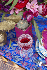Wedding table arrangement in desert sand of Morocco stile 