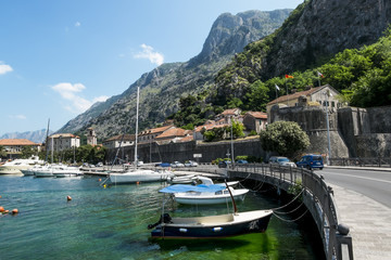 Fototapeta na wymiar Navy Pier with yachts in the town of Kotor