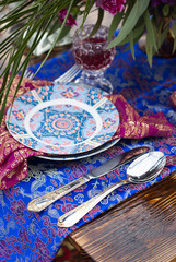 Wedding table arrangement in desert sand of Morocco stile
