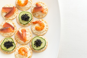 Canape with seafood on the plate