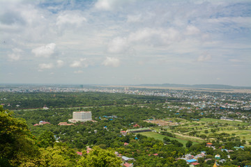 Fototapeta na wymiar Viewpoint at Mandalay Hill is a major pilgrimage site. A panoramic view of Mandalay from the top of Mandalay Hill alone makes it worthwhile to attempt a climb up
