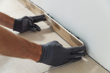 Laying the tiles