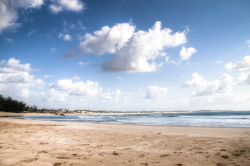 Very rustic and empty beach at the Indian Ocean in the coastal town Praia do Tofo in Inhambane, Mozambique

