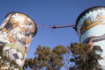 Fototapeta premium The Orlando Towers in Soweto, a township of Johannesburg in South Africa. Between the towers is a bridge for bungee jumping 