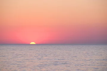 Cercles muraux Mer / coucher de soleil Landscape with the image of a sea sunset