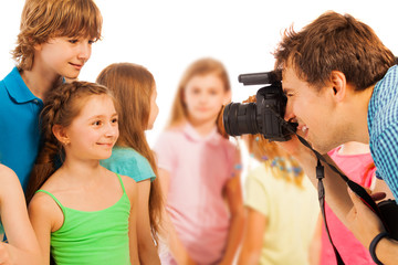 Professional photographer photographing kids