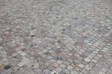 Fototapeta premium Street stone block pavement texture and background
