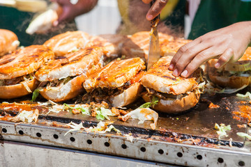  close up of street food sandwich shucos from Ecuador