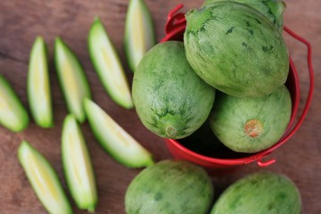 baby melon on wooden vintage