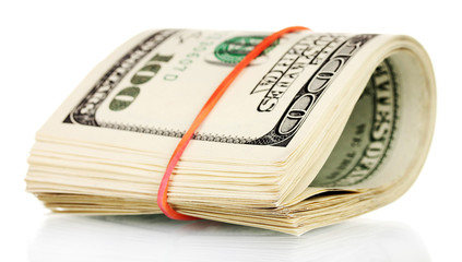 A lot of one hundred dollar bills tied rubber band isolated on white