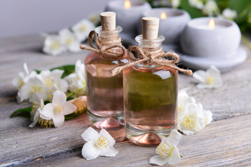 Obraz na płótnie Canvas Spa composition with jasmine flowers on table close-up
