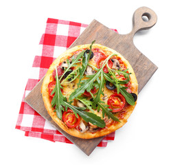 Tasty pizza with vegetables and arugula on cutting board isolated on white