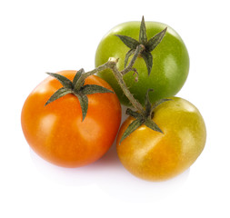 Green tomatoes isolated on white