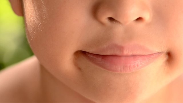 Close up fill tooth of kid by alloy material