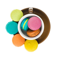 Colorful macarons on white background. Macaron or Macaroon is sw