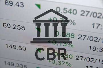 Building icon with inscription CBR. Financial data on computer  screen. Multiple exposure.