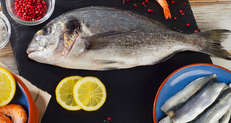 Raw Fish  with  spices , salt and shrimps - healthy food.