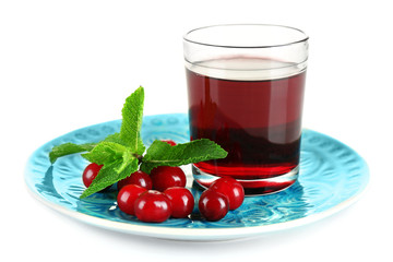 Glass of cherry juice isolated on white