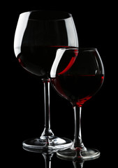Glasses of wine isolated on black