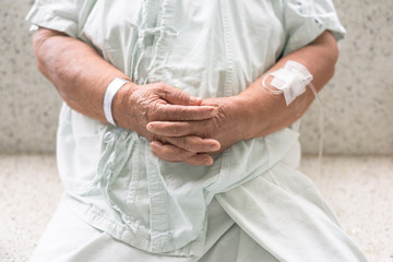 Closeup senior patient's hands