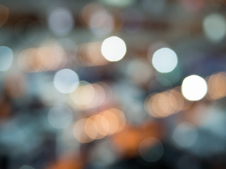 Abstract photo of light burst raindrops and glitter bokeh lights background. Image is blurred and made with colorful filters.