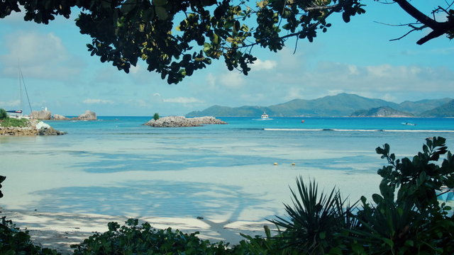 Exotic dream - Beach on island La Digue in Seychelles. Blue lagoon in La Digue, Seychelles with view to Praslin.