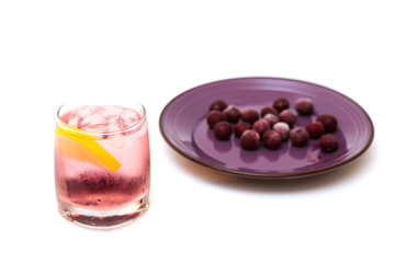 Cold refreshing berry drink with ice