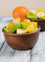Fruit salad with kiwi, banana and orange