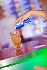 Barman  prepares cocktail