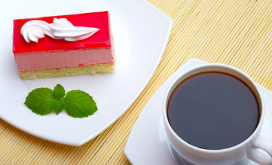 cup of coffee and cake with mint