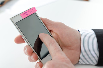 Businessman using his smartphone