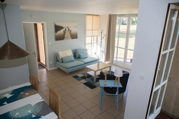 Modern, bright, clean, living room   in a  house