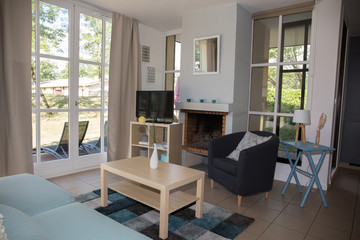 Modern, bright, clean, living room   in a  house