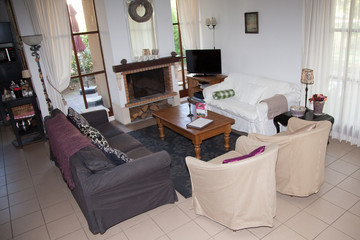 Modern, bright, clean, living room   in a  house