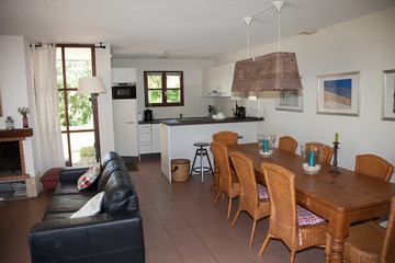 Modern, bright, clean, living room   in a  house