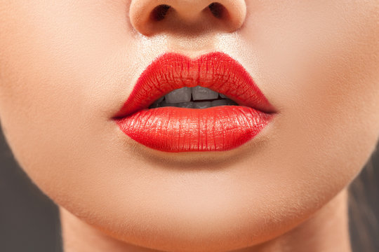 Nice close up woman lips with red lipstick