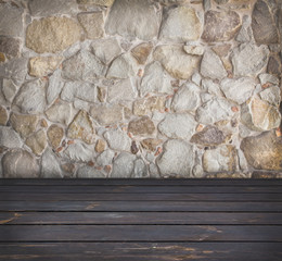 stone wall and timber floor