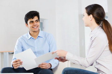 Fototapeta premium Two young people working as partners