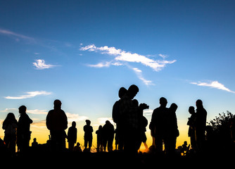 Fototapeta premium People enjoys the sunrise on the top of Merbabu volcano in Indon